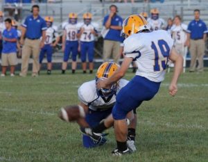 Junior Hans Hinebaugh attempts a field goal against Batavia (Photo by Pennell).
