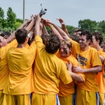(Photo by: Steve Spooner.)  Mariemont players celebrate at the end of last season after winning the state championship game.  Many returning players hope to do the same this year.  