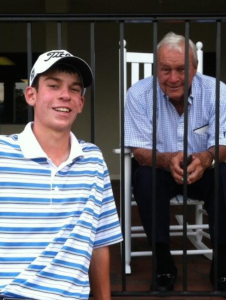 Playing alongside the greats, Grimmer had the opportunity to meet many of his idols at the U.S. Open. Here he stands next to golfing legend Arnold Palmer. (PHOTO BY GRIMMER)