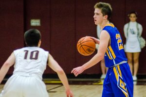 Junior guard Joey Kromer led the Warriors in points (16.1) and assists (2.3) per game. He also shot 40.5% on 3-pointers and 75% on foul shots, both team highs. (PHOTO BY SPOONER)