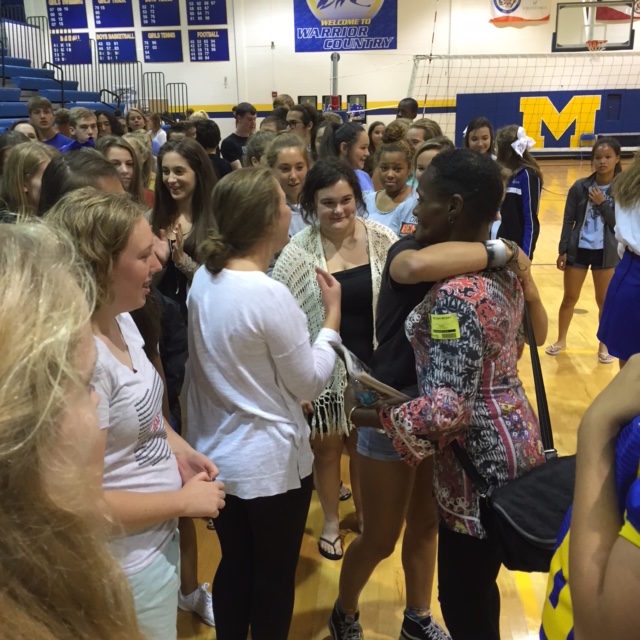 Lily Toman embraces Melissa and thanks her for sharing her story. (PHOTO BY WISEMAN)